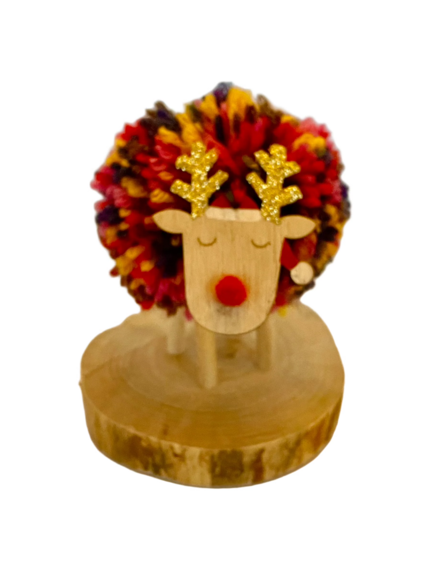Cute Xmas sleeping multicolour pompom reindeer on wooden base