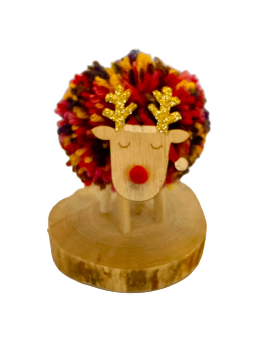 Cute Xmas sleeping multicolour  pompom reindeer on wooden base